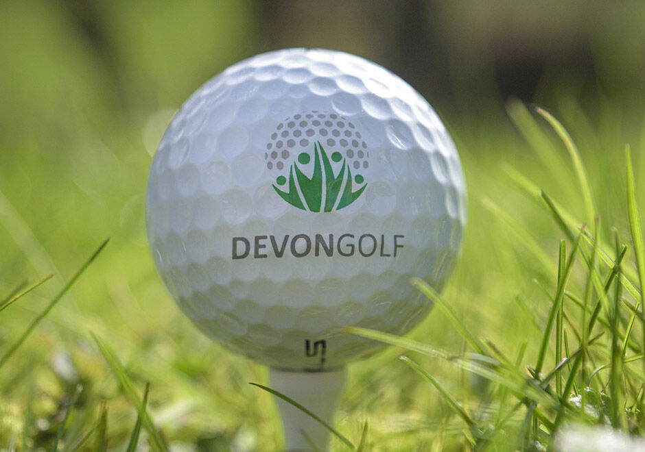 Devon Golf - Logo on golf ball on tee